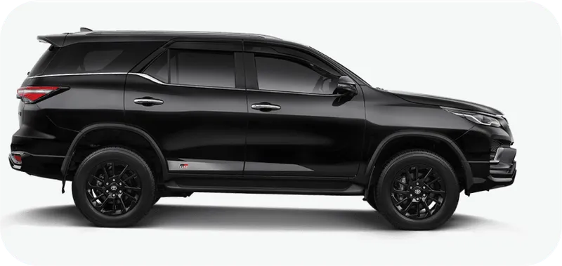 A black suv parked in a white background.